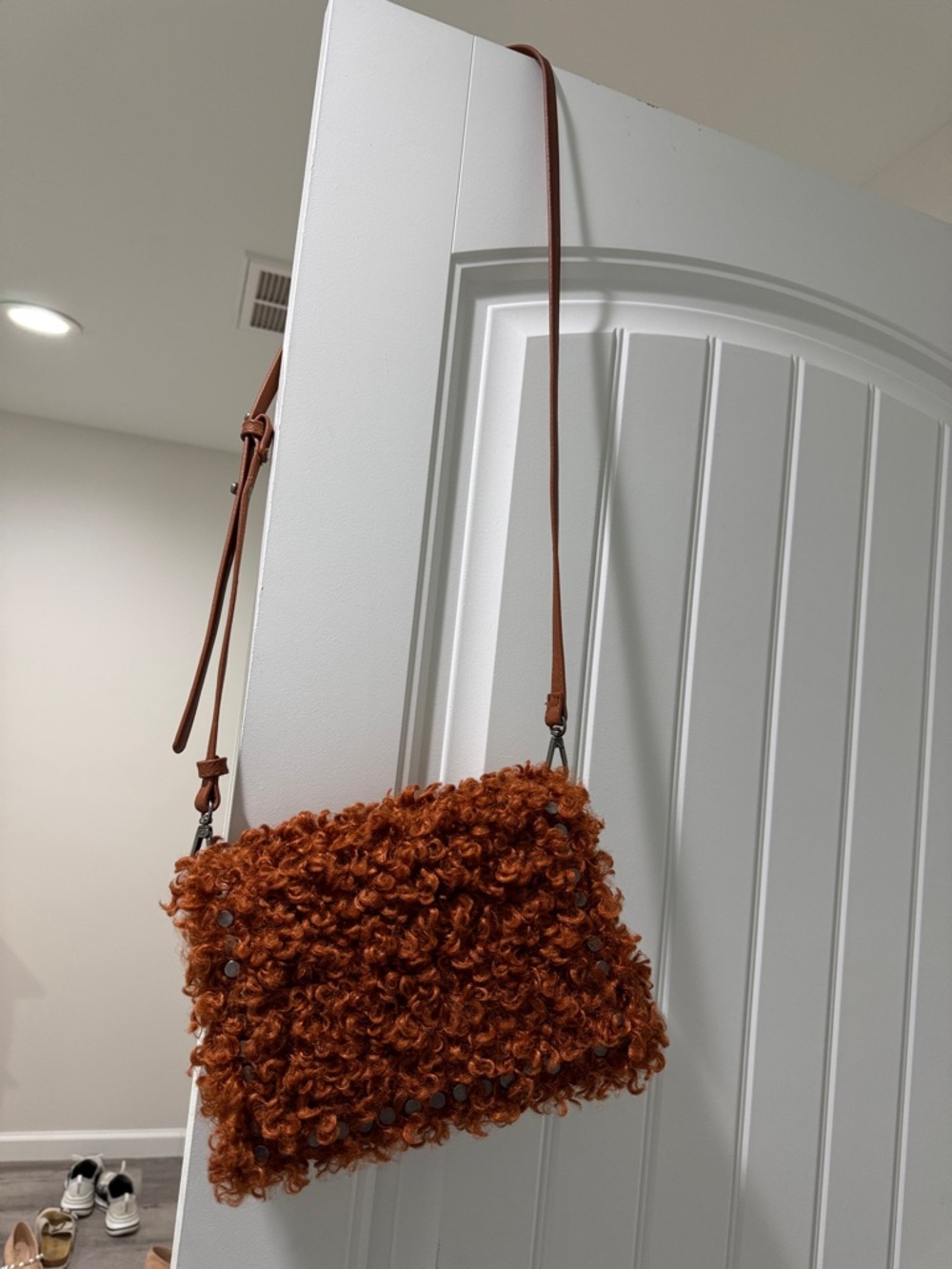 Steve Madden Curly Faux Shearling Crossbody in Rust Orange